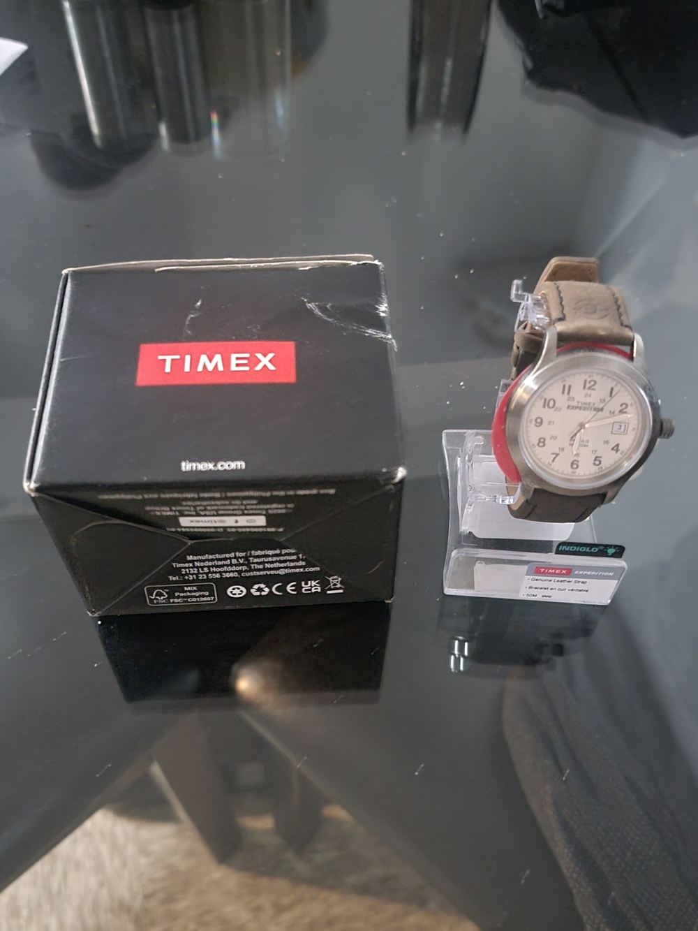 Timex Men's Brown Leather Strap Watch with White Dial.